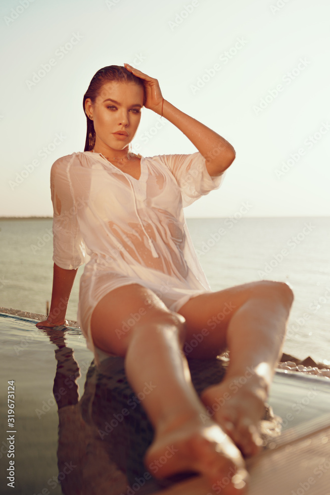 demet bulut add wet woman in white shirt photos photo