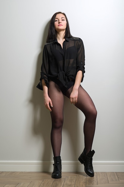 women in pantyhose and boots