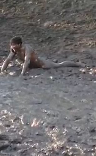 andrea yuill recommends nude men in mud pic