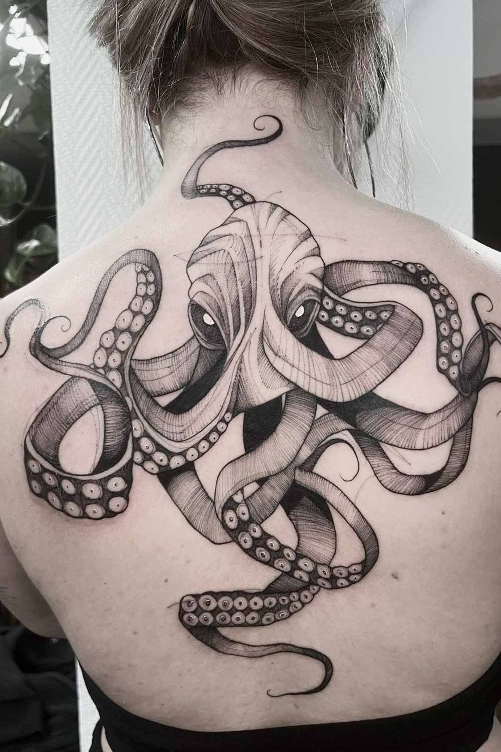 ajanta ghosh recommends woman with octopus tattoo pic