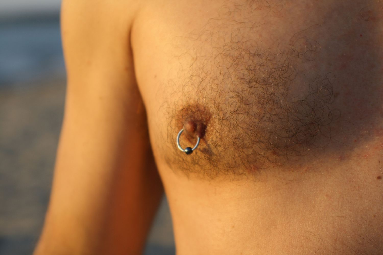 nipple piercing small breasts