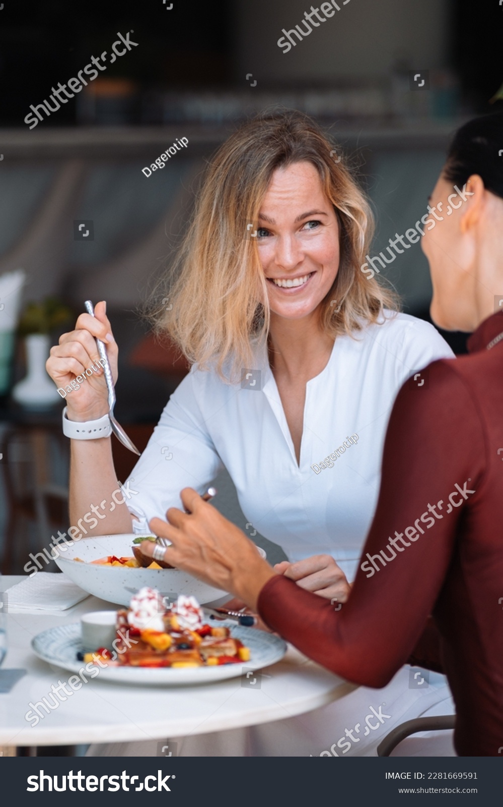 two women eating each other