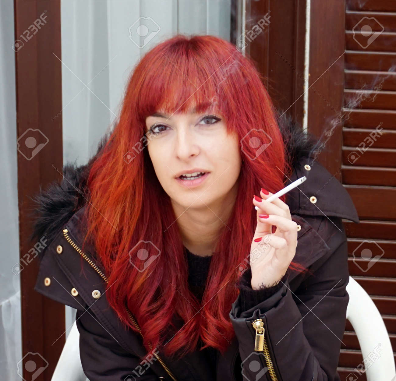dianne marfega add red headed woman with a cigarette photo