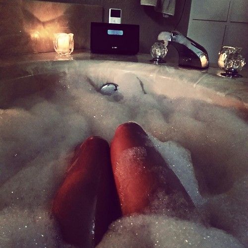 legs in bubble bath