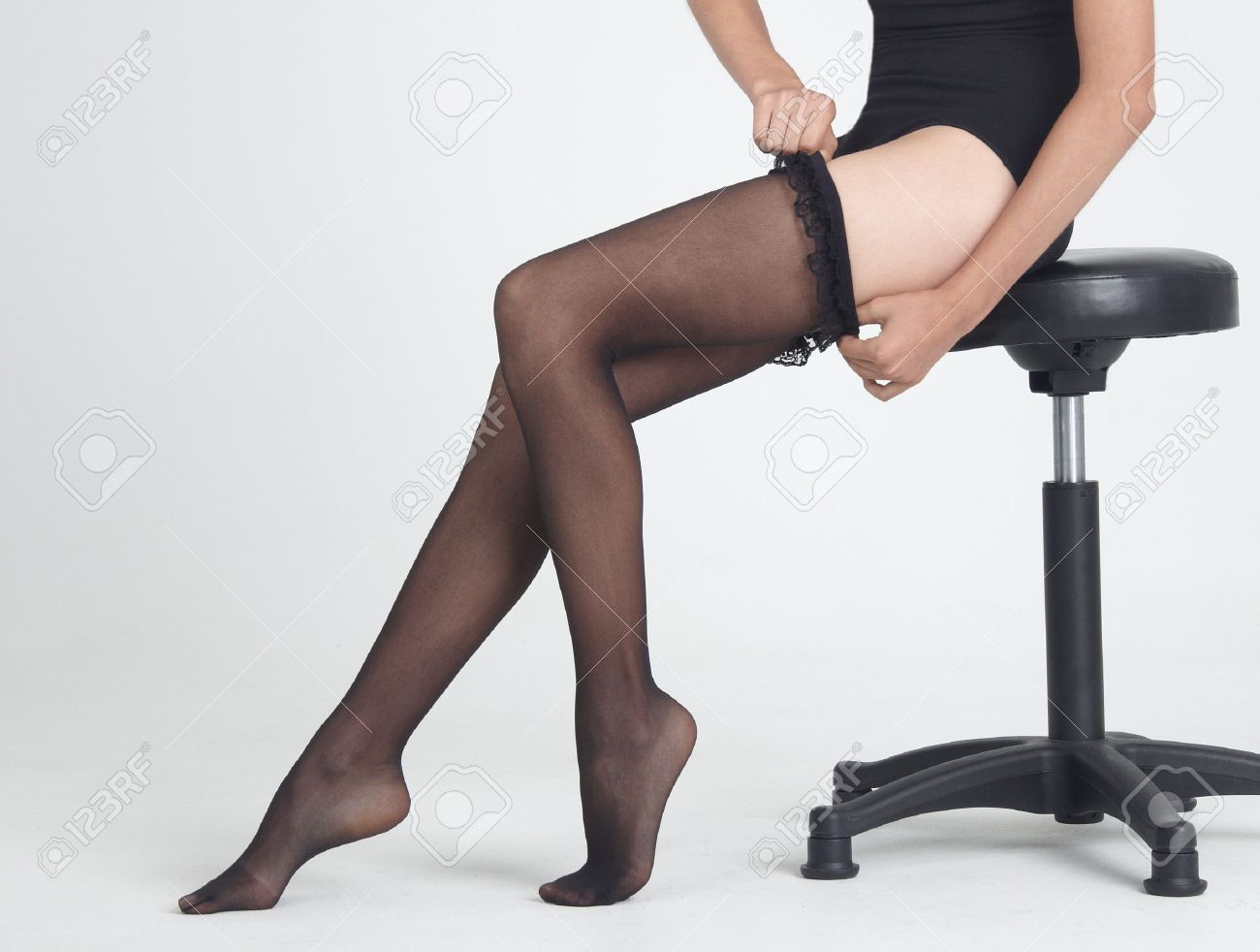 alicia mccann recommends woman putting stockings on pic