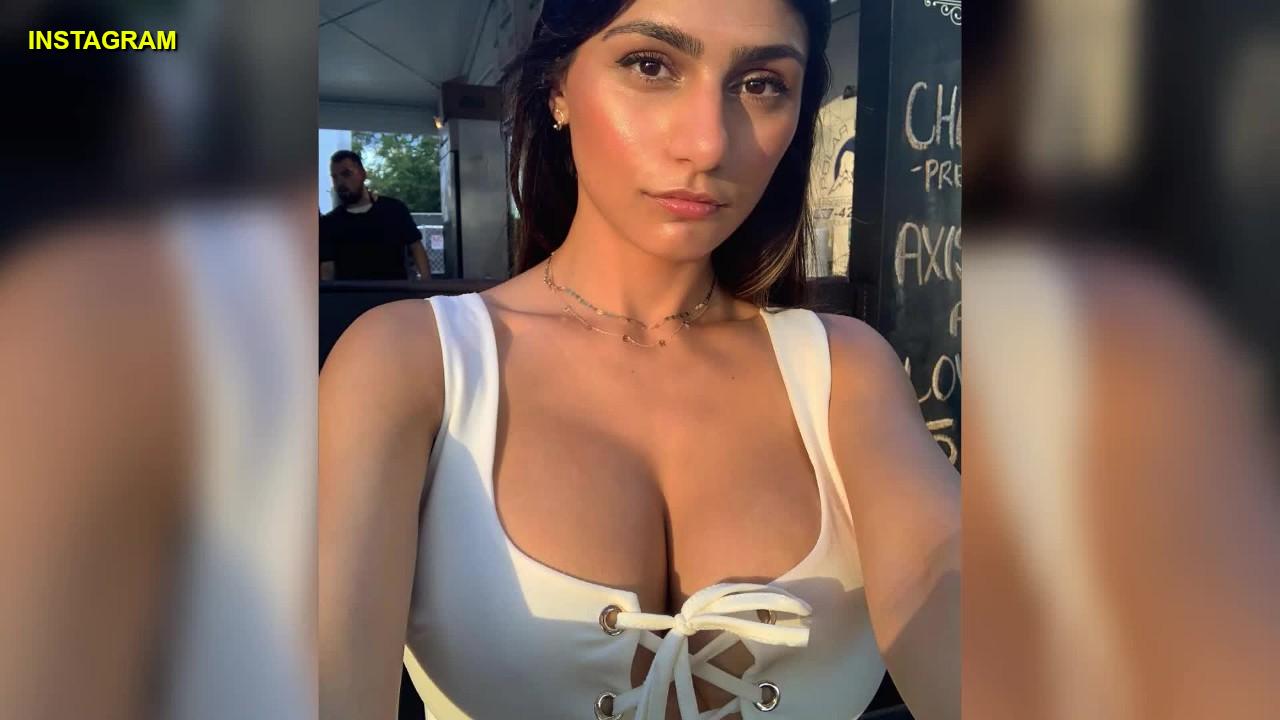 debbie lynn allen add mia khalifa breast implants photo