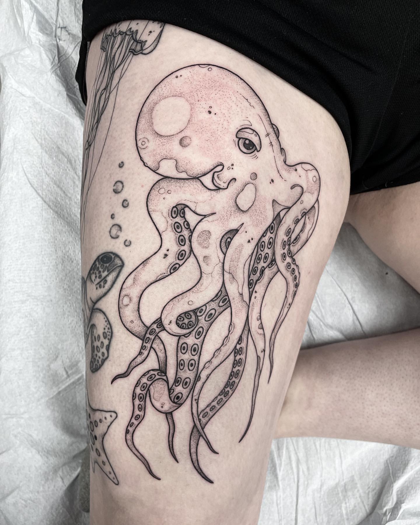 adrien clarke recommends woman with octopus tattoo pic