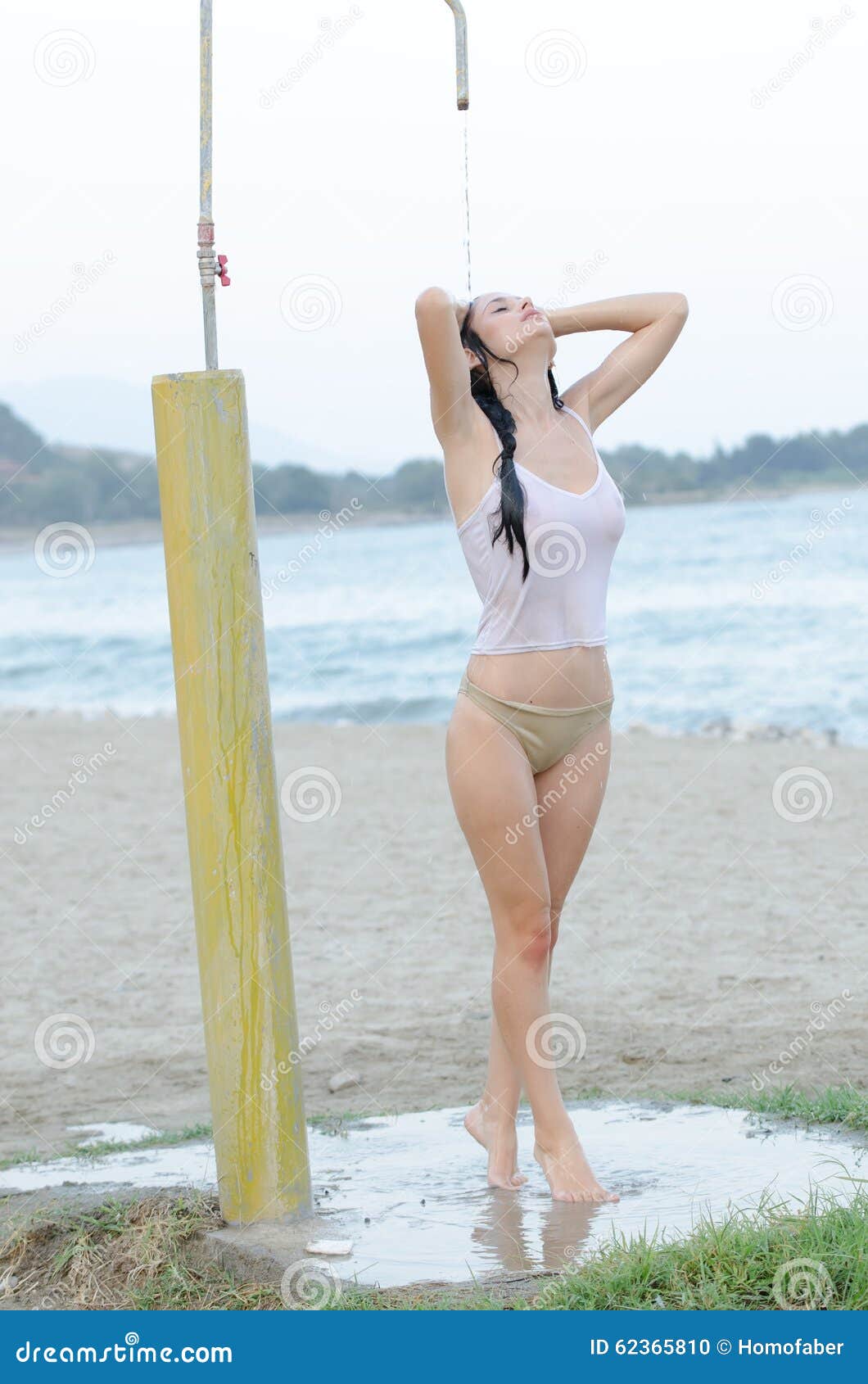 wet woman in white shirt photos