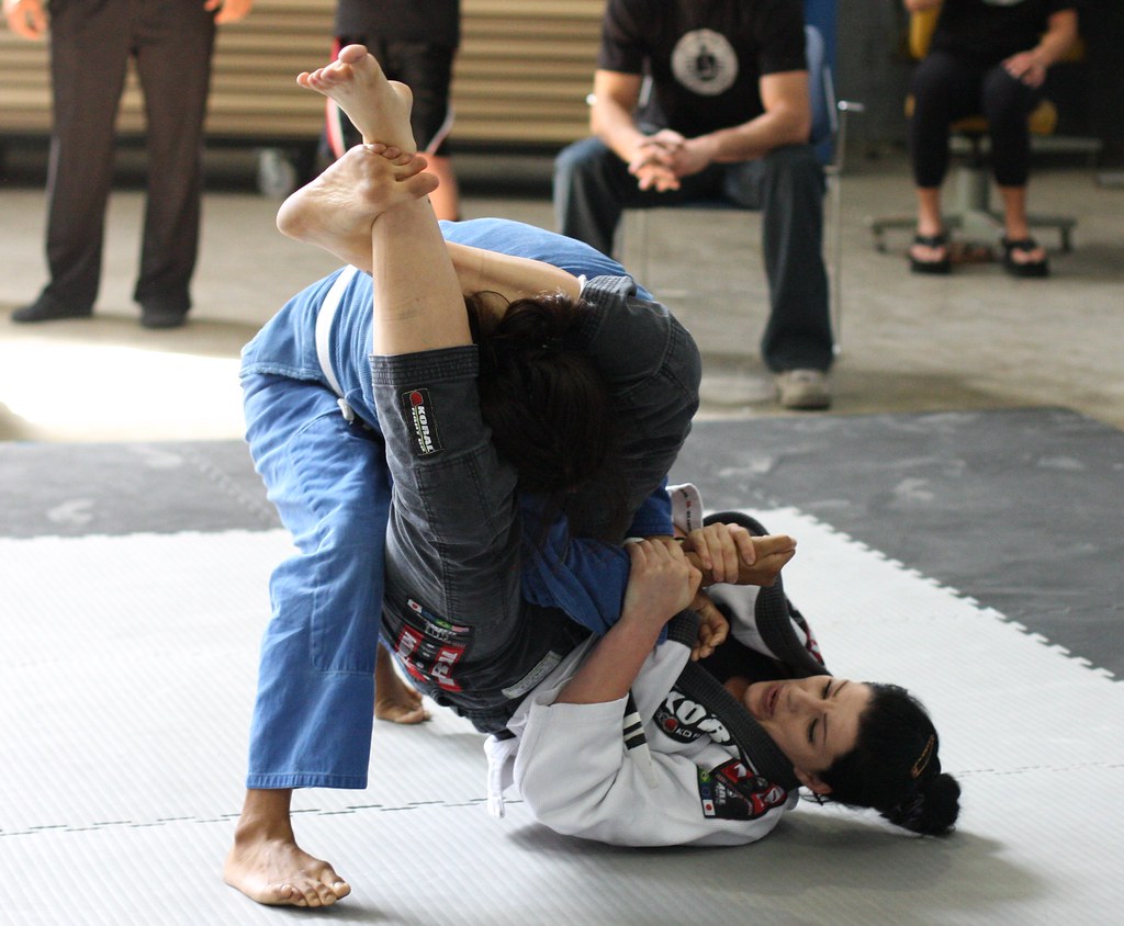 andrea jonson recommends woman triangle chokes man pic