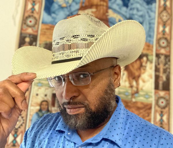 cowboy hat and glasses