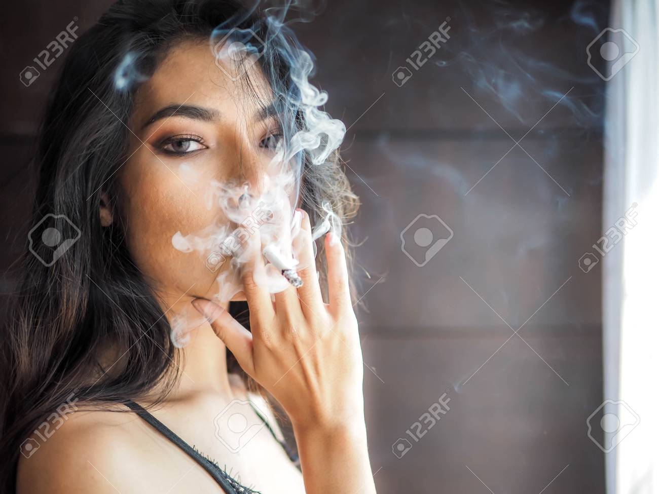 austin held add beautiful women smoking weed photo