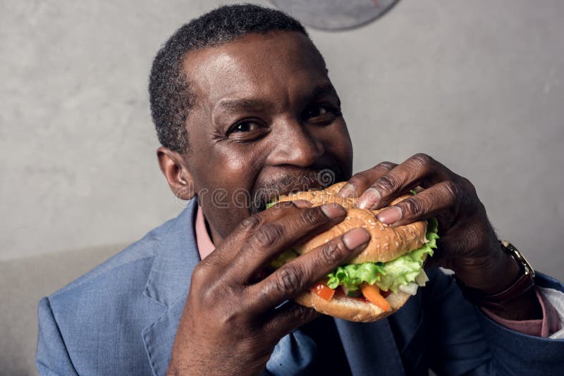 beckie bartlett recommends black man eating hamburger pic