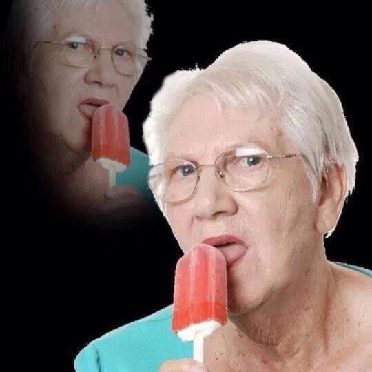 old lady licking popsicle