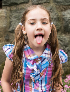 amel sayed add girl sticking out tongue meme photo