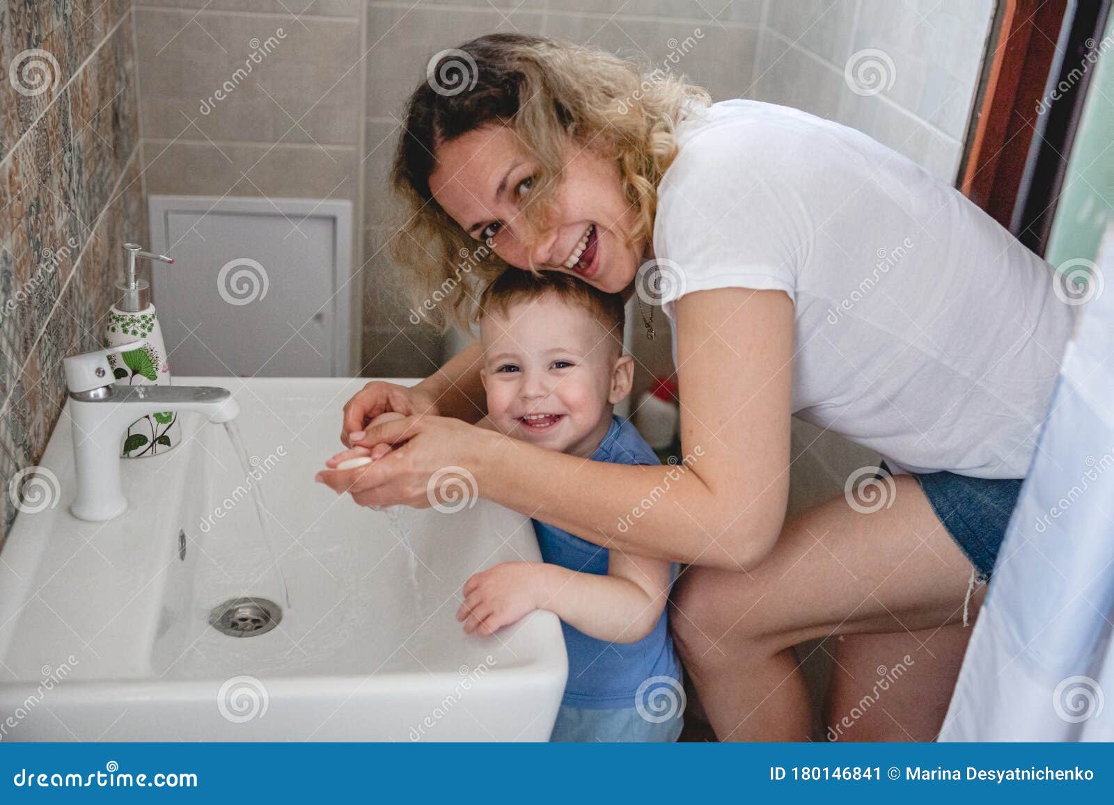 barbara villalobos add photo mom helps son bath