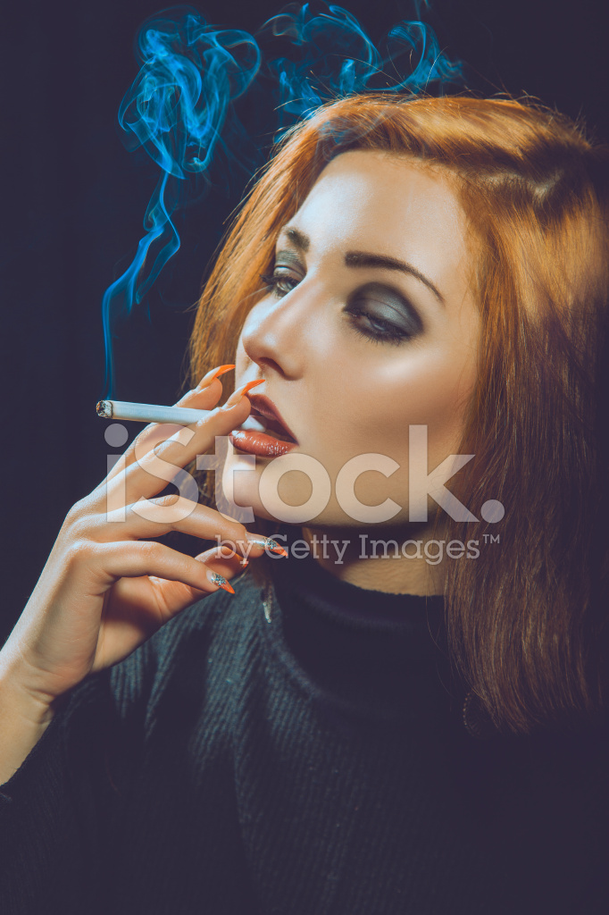 Best of Red headed woman with a cigarette