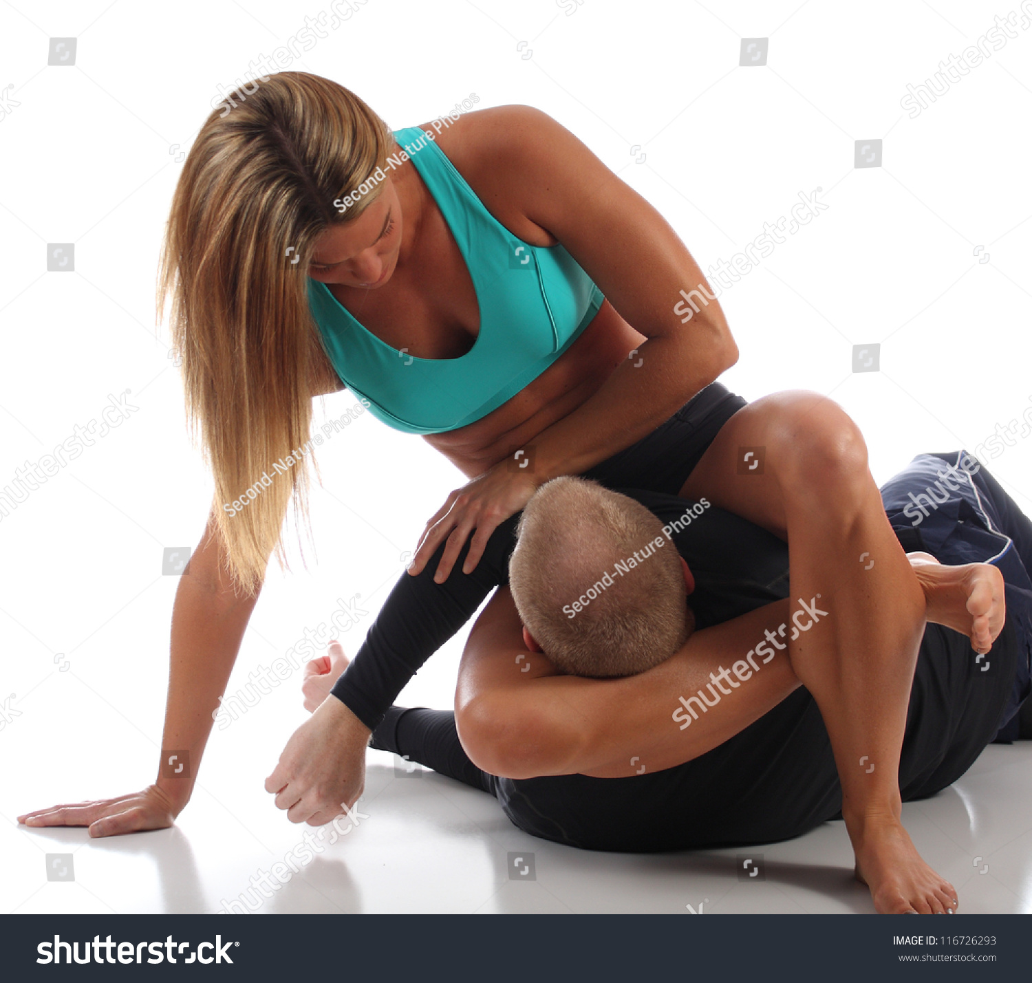 woman triangle chokes man